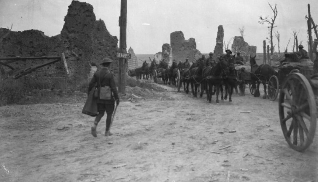 110_Canadian Ammunition Column passing through recently captured village. Advance East of Arras. September, 1918.